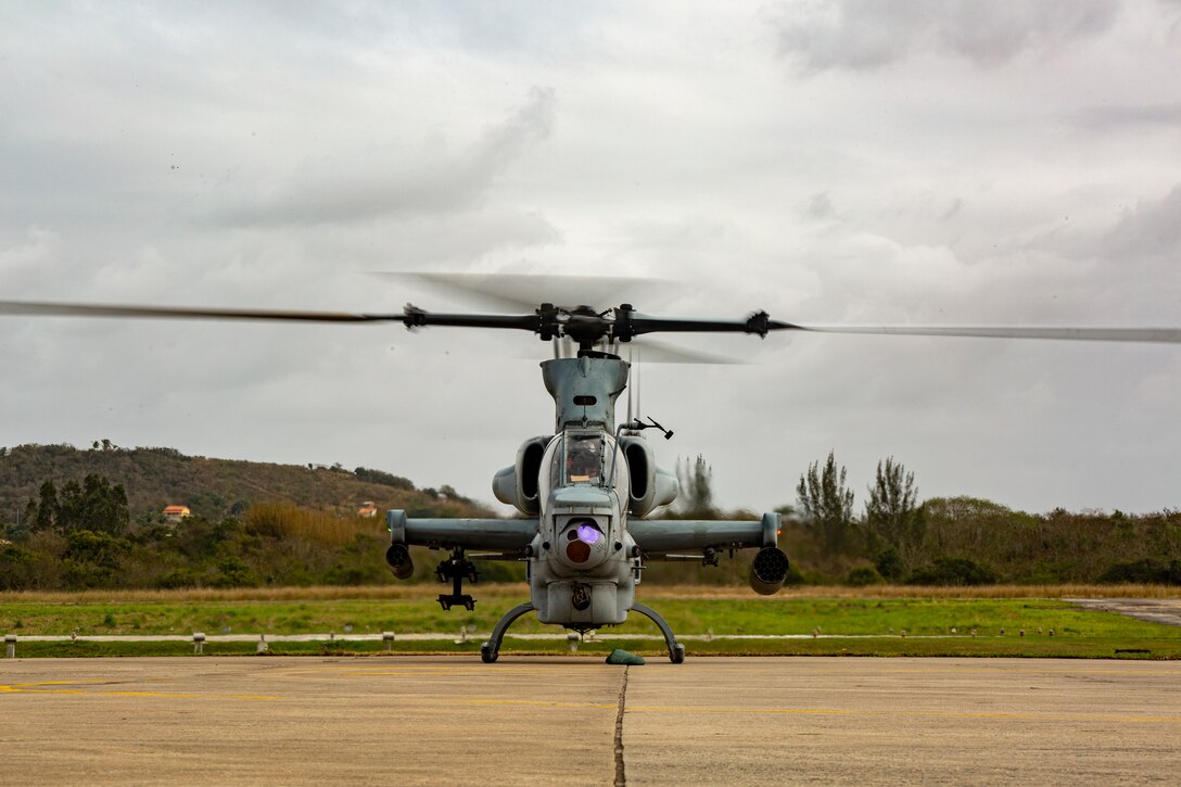 A U.S. Marine Corps AH-1Z Viper attack helicopter with Marine Light Attack Helicopter Squadron (HMLA) 773, 4th Marine Aircraft Wing, Marine Forces Reserve in support of Special Purpose Marine Air-Ground Task UNITAS LXIII, prepares to take off at São Pedro da Aldeia, Brazil, Sept. 11, 2022. UNITAS is the world's longest-running annual multinational maritime exercise that focuses on enhancing interoperability among multiple nations and joint forces during littoral and amphibious operations in order to build on existing regional partnerships and create new enduring relationships that promote peace, stability, and prosperity in the U.S. Southern Command’s area of responsibility. Benton is a native of Vero Beach, FL.  (U.S. Marine Corps photo by 1st Lt. Mark L. Andries)