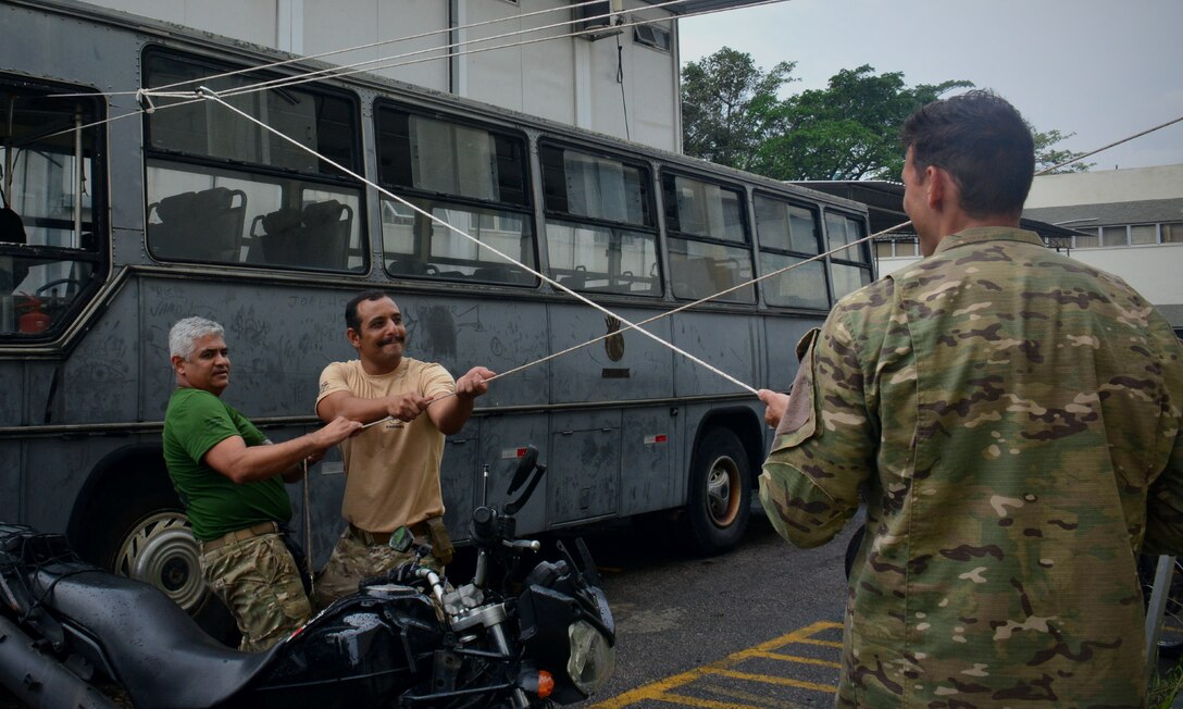 RIO DE JANEIRO (Sept. 15, 2022) Members of the Brazilian Navy take part in a tactics, techniques and procedures (TTP) exchange with Explosive Ordnance Disposal Mobile Unit (EODMU) 2 during UNITAS LXIII, Sept. 15, 2022. UNITAS is the world’s longest-running maritime exercise. Hosted this year by Brazil, it brings together multinational forces from Belize, Brazil, Cameroon, Chile, Colombia, Dominican Republic, Ecuador, France, Guyana, Jamaica, Mexico, Namibia, Panama, Paraguay, Peru, South Korea, Spain, United Kingdom, Uruguay, and the United States conducting operations in and off the coast of Rio de Janeiro. The exercise trains forces to conduct joint maritime operations through the execution of anti-surface, anti-submarine, anti-air, amphibious and electronic warfare operations that enhance warfighting proficiency and increase interoperability among participating naval and marine forces. (U.S. Navy photo by Mass Communication Specialist 3rd Class Jahlena Royer/Released)