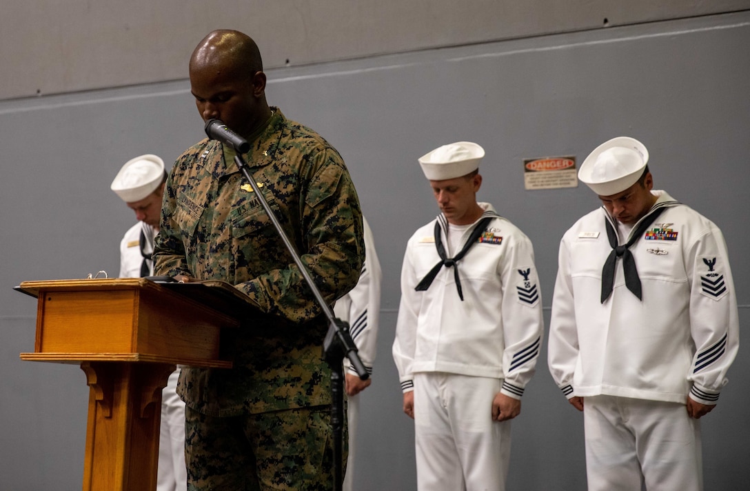 ATLANTIC OCEAN (Sept. 11, 2022) – U.S. Navy Chaplain Pohlmarc Lawrence delivers the invocation during a 9/11 memorial ceremony in the hangar bay of the amphibious transport dock ship USS Mesa Verde (LPD 19), Sept. 11, 2022. Mesa Verde is currently underway in the Atlantic Ocean in support of exercise UNITAS LXIII. UNITAS is the world’s longest-running maritime exercise. Hosted this year by Brazil, it brings together multinational forces from Belize, Brazil, Cameroon, Chile, Colombia, Dominican Republic, Ecuador, France, Guyana, Jamaica, Mexico, Namibia, Panama, Paraguay, Peru, South Korea, Spain, United Kingdom, Uruguay, and the United States conducting operations in and off the coast of Rio de Janeiro. The exercise trains forces to conduct joint maritime operations through the execution of anti-surface, anti-submarine, anti-air, amphibious and electronic warfare operations that enhance warfighting proficiency and increase interoperability among participating naval and marine forces. (U.S. Navy photo by Mass Communication Specialist 3rd Class Sydney Milligan)