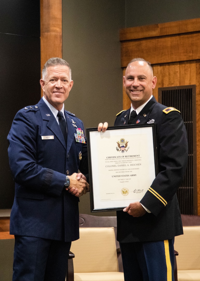 Family, friends and colleagues gathered at the Illinois Military Academy's auditorium Sept. 17, to celebrate the career of Col. Daniel Reichen and wish him well in future endeavors.