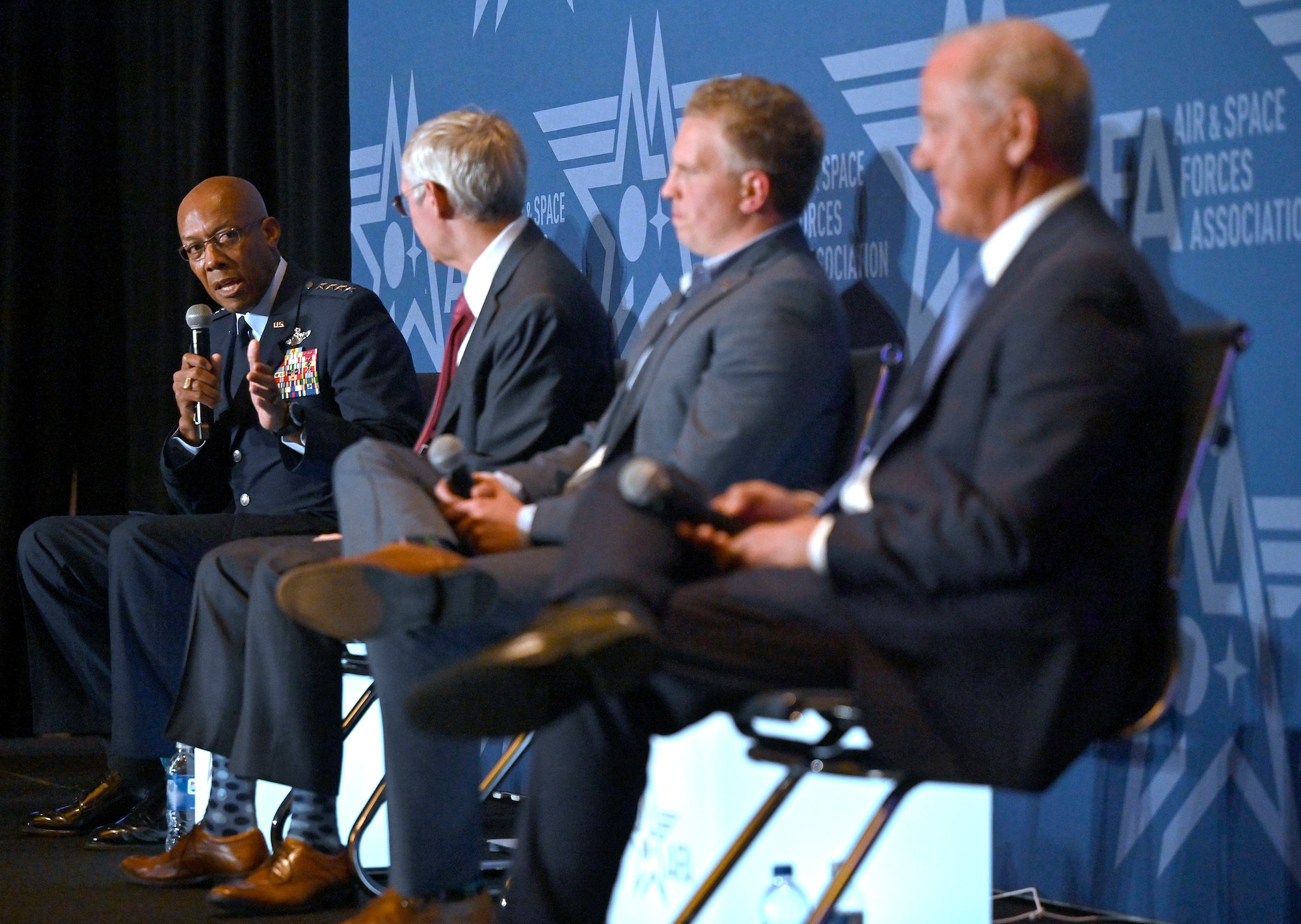 Air Force Chief of Staff Gen. CQ Brown, Jr. speaks at the Communities in the Fight panel at the 2022 Air Force Association Air, Space and Cyber Conference at National Harbor, Md., Sept 21, 2022. The panel focused on partnering with local communities and supporting Airmen. (U.S. Air Force photo by Staff Sgt. Chad Trujillo.)