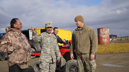 Soldiers of the Alaska Army National Guard transfer their luggage prior to boarding a HC-130 Combat King II for transport to Bethel, Alaska, Sept. 21, 2022. Approximately 100 members of the Alaska Organized Militia, which is comprised of the Alaska National Guard, Alaska State Defense Force and Alaska Naval Militia, were activated following a disaster declaration issued Sept. 17 after the remnants of Typhoon Merbok caused dramatic flooding across more than 1,000 miles of Alaskan coastline. (Alaska National Guard photo by Victoria Granado)