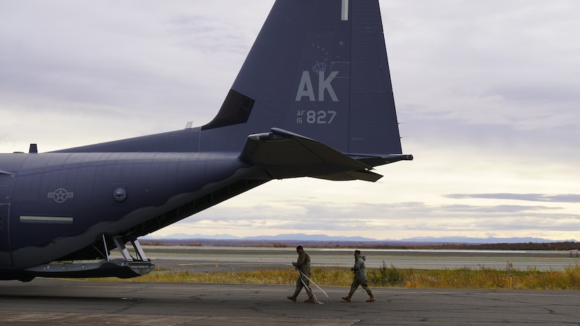 Members of Joint Task Force – Alaska off load equipment and supplies after arriving in Bethel for disaster relief response Sept. 21, 2022, via a HC-130J Combat King II aircraft from the 176th Wing’s 211th Rescue Squadron. Approximately 100 service members from the Alaska National Guard, Alaska State Defense Force and Alaska Naval Militia were activated following a disaster declaration issued Sept. 17 after the remnants of Typhoon Merbok caused dramatic flooding across more than 1,000 miles of Alaskan coastline. A JTF in Nome is standing up concurrently as part of Operation Merbok Response (Alaska National Guard photo by Dana Rosso)