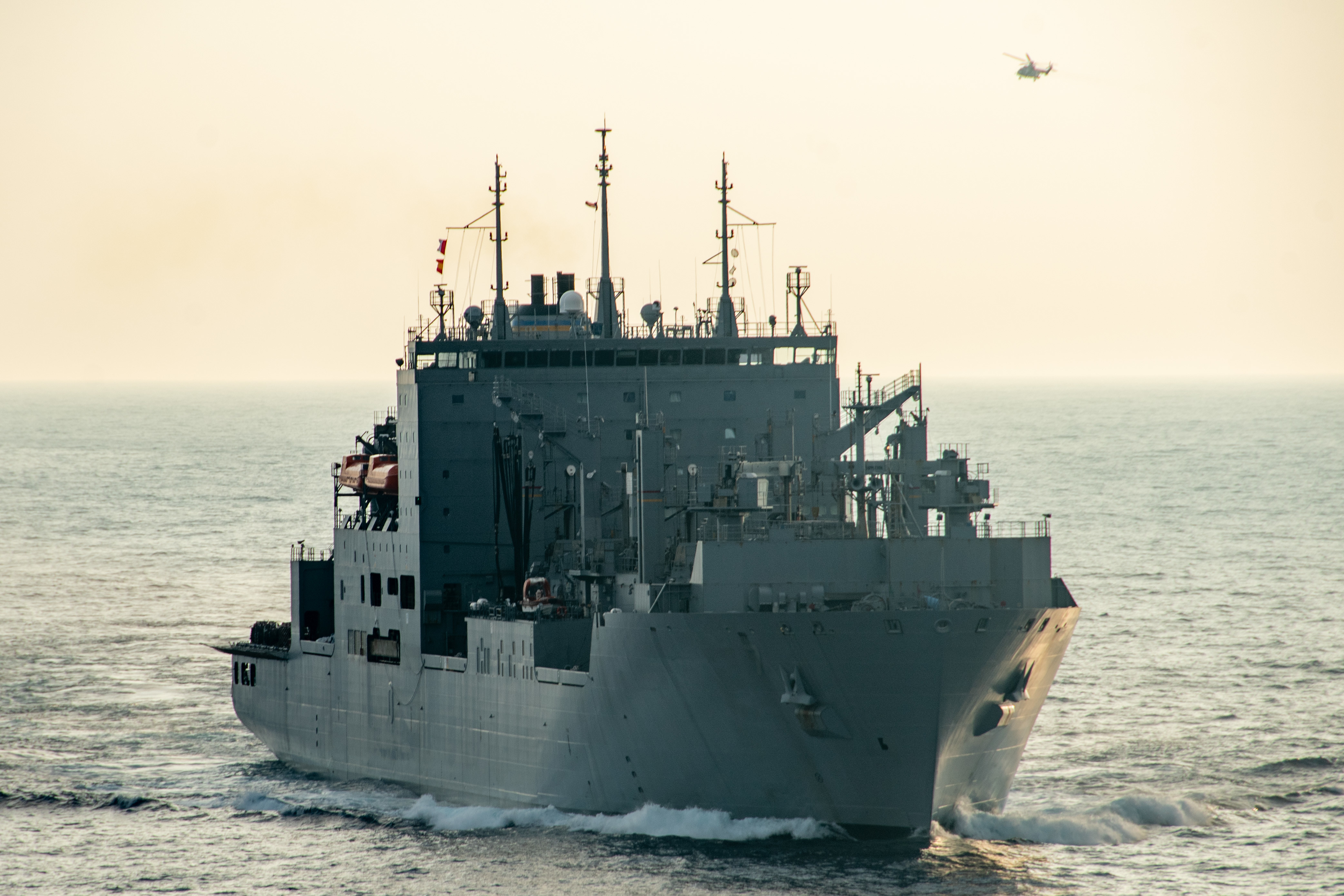 USNS Carl Brashear (T-AKE 7) approaches USS Ronald Reagan (CVN 76), to conduct a replenishment-at-sea in the Philippine Sea, Sept. 20.