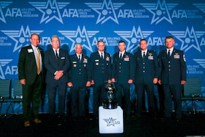 The 178th Attack Squadron, 119th Wing, North Dakota National Guard, is presented with the Mitchell Institute for Aerospace Studies’ General Atomics Remotely Piloted Aircraft Squadron of the Year Trophy for 2021 during the 2022 Air and Space Forces Association’s Air, Space and Cyber Conference at the Gaylord National Harbor, National Harbor, Maryland, Sept. 19, 2022. The 178th is the first National Guard unit to earn this award, which is presented annually for outstanding performance by RPA squadrons in achieving intelligence, surveillance, and persistent attack and reconnaissance over the preceding calendar year.