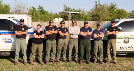 firefighters pose for photo