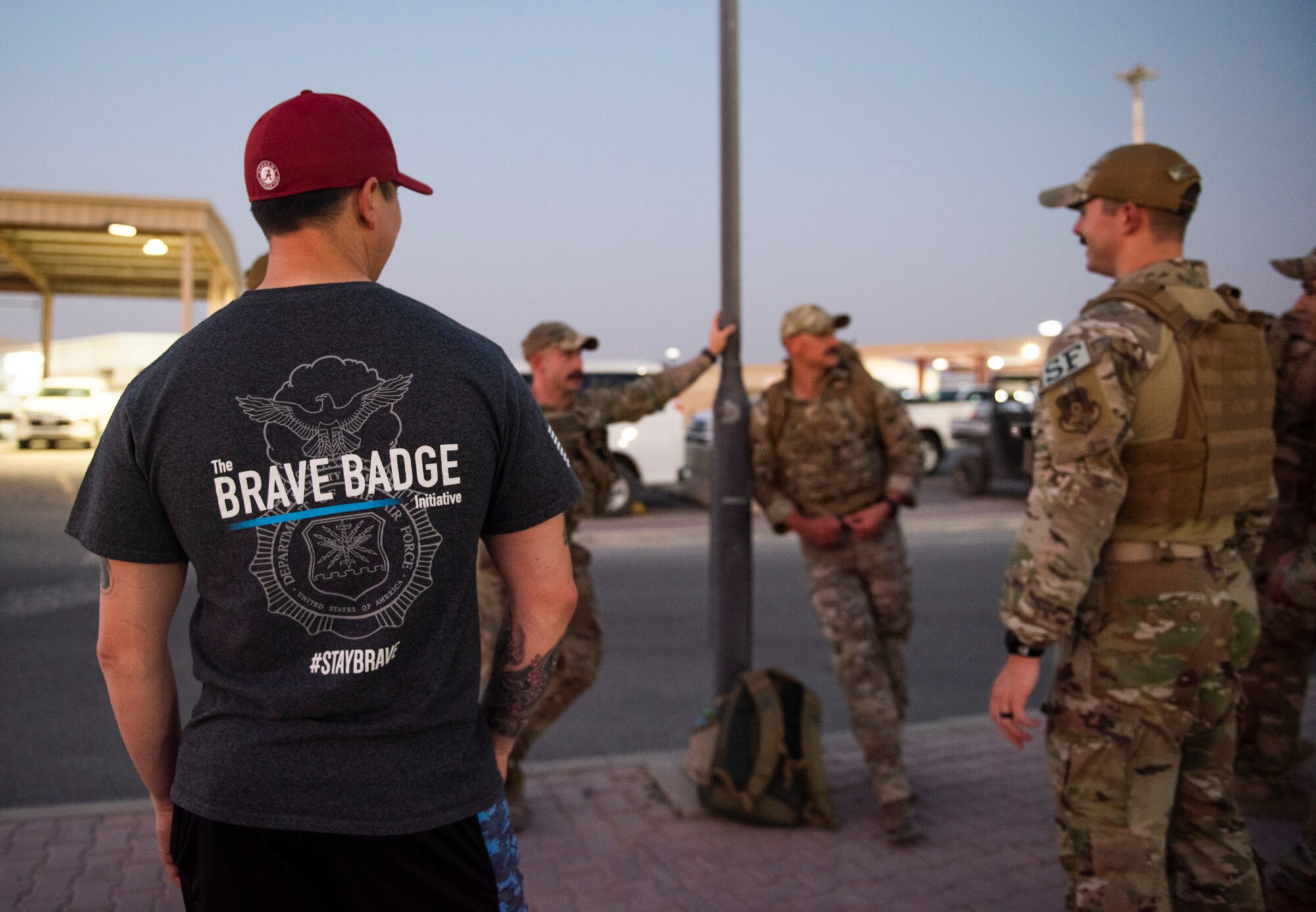 Lt. Col. Tito Ruiz, 386 Expeditionary Security Forces Squadron commander (left), prepares to send his Airmen off on a memorial ruck march at Ali Al Salem Air Base, Kuwaiti, 11 Sept. 2022 in remembrance of those lost on Sept. 11, 2001. Ruiz, who marched more than 2.5 miles earlier for the 24-hour ruck event, said “It’s important to remember the day that changed the course of our nation and to memorialize the lives lost as well as the sacrifices made by responders and civilians alike. We get to see the tangible results of why we are over here. Although the missions have slightly changed the reason still remains the same.” (U.S. Air Force photo by Senior Master Sgt. David Salanitri)