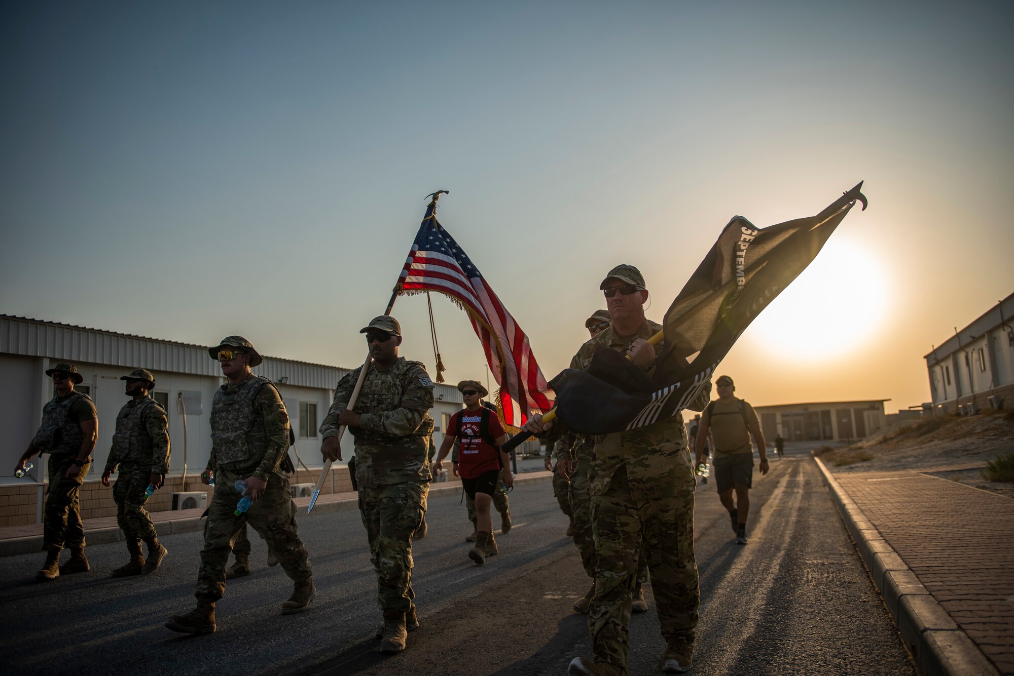 Members from the 386 Air Expeditionary Wing marched throughout the evening at Ali Al Salem Air Base, Kuwaiti, 11 Sept. 2022 in remembrance of those lost on Sept. 11, 2001. Members from multiple branches of service and coalition teammates from throughout the world took part in the 24-hour march. (U.S. Air Force photo by Senior Master Sgt. David Salanitri)