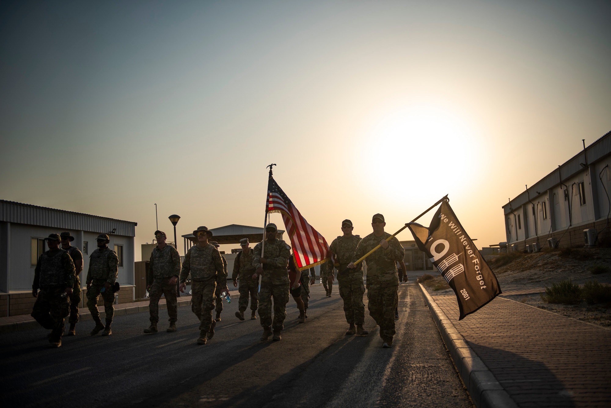 Members from the 386 Air Expeditionary Wing marched throughout the evening at Ali Al Salem Air Base, Kuwaiti, 11 Sept. 2022 in remembrance of those lost on Sept. 11, 2001. Members from multiple branches of service and coalition teammates from throughout the world took part in the 24-hour march. (U.S. Air Force photo by Senior Master Sgt. David Salanitri)