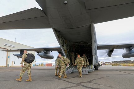 Members of Joint Task Force – Alaska arrive in Bethel for disaster relief response Sept. 21, 2022, via a HC-130J Combat King II aircraft from the 176th Wing’s 211th Rescue Squadron. Approximately 100 service members from the Alaska National Guard, Alaska State Defense Force and Alaska Naval Militia were activated following a disaster declaration issued Sept.17 after the remnants of Typhoon Merbok caused dramatic flooding across more than 1,000 miles of Alaskan coastline.