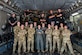 U.S. Air Force Airmen from the 15th and 16th Airlift Squadrons and personnel from the North Charleston Police Department pose for a group photo during a joint training exercise at Joint Base Charleston, South Carolina, Sept.16, 2022. The exercise prepared loadmasters to load larger vehicles onto a C-17 Globemaster III aircraft - a potential wartime scenario. (U.S. Air Force photo by Airman 1st Class Christian Silvera)