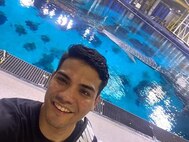 Sgt. Kevin Reyes is ready to suit up and swim with aquatic life at the Georgia Aquarium