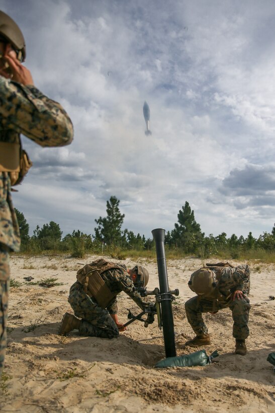 U.S. Marines with 1st Battalion, 6th Marine Regiment, 2d Marine Division, fire a M252 81mm mortar system during a Marine Corps Combat Readiness Evaluation on Camp Lejeune, North Carolina, Sept. 14, 2022. The purpose of a MCCRE is to formally evaluate the unit’s combat readiness in preparation for deployment. (U.S. Marine Corps photo by Lance Cpl. Emma Gray)