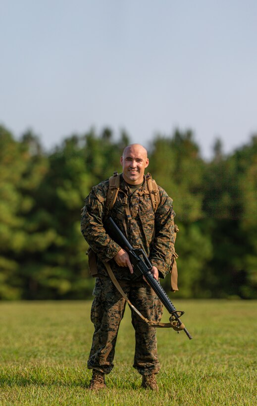 U.S. Marine Corps Capt. David Soha, a Jacksonville, Florida, native and an infantry officer with 2d Marine Division, poses for a photo during the Division Leader Assessment Program 4-22 on Fort A.P. Hill, Virginia, Sept. 15, 2022. The assessment program provides Marines with learning and mentorship opportunities, which helps train and develop Marines that demonstrate an apex level of lethality, endurance and comprehensive warfighting ability. (U.S. Marine Corps photo by Lance Cpl. Ryan Ramsammy)
