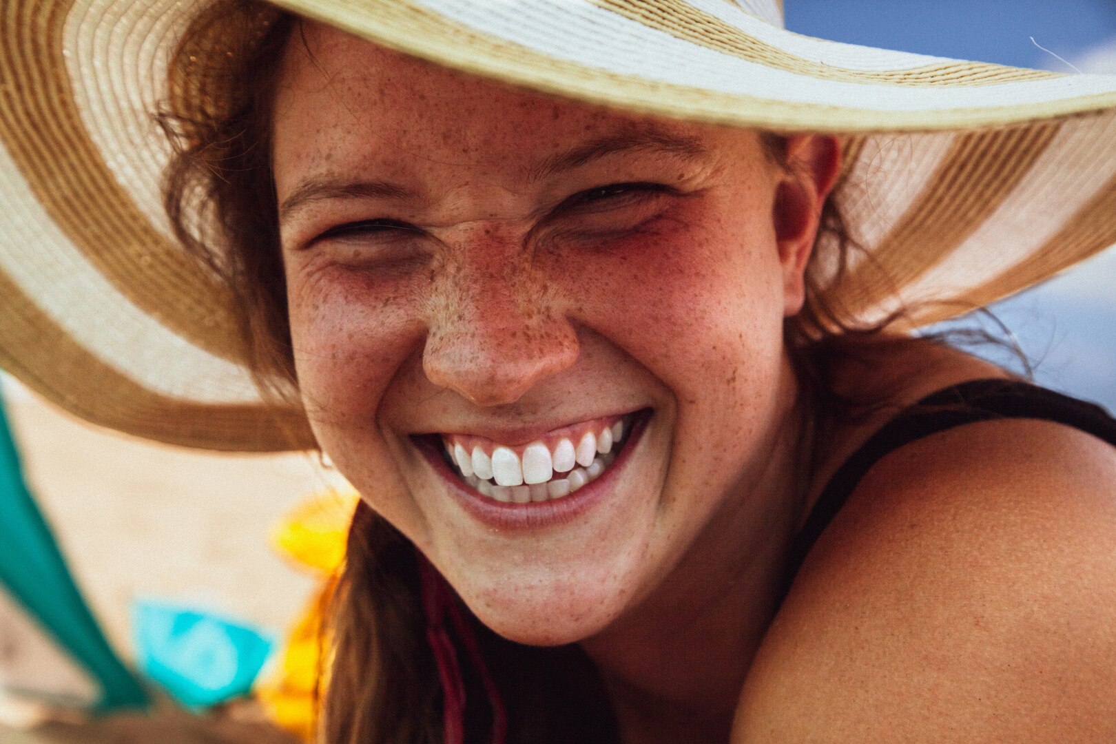 A woman shows off her smile