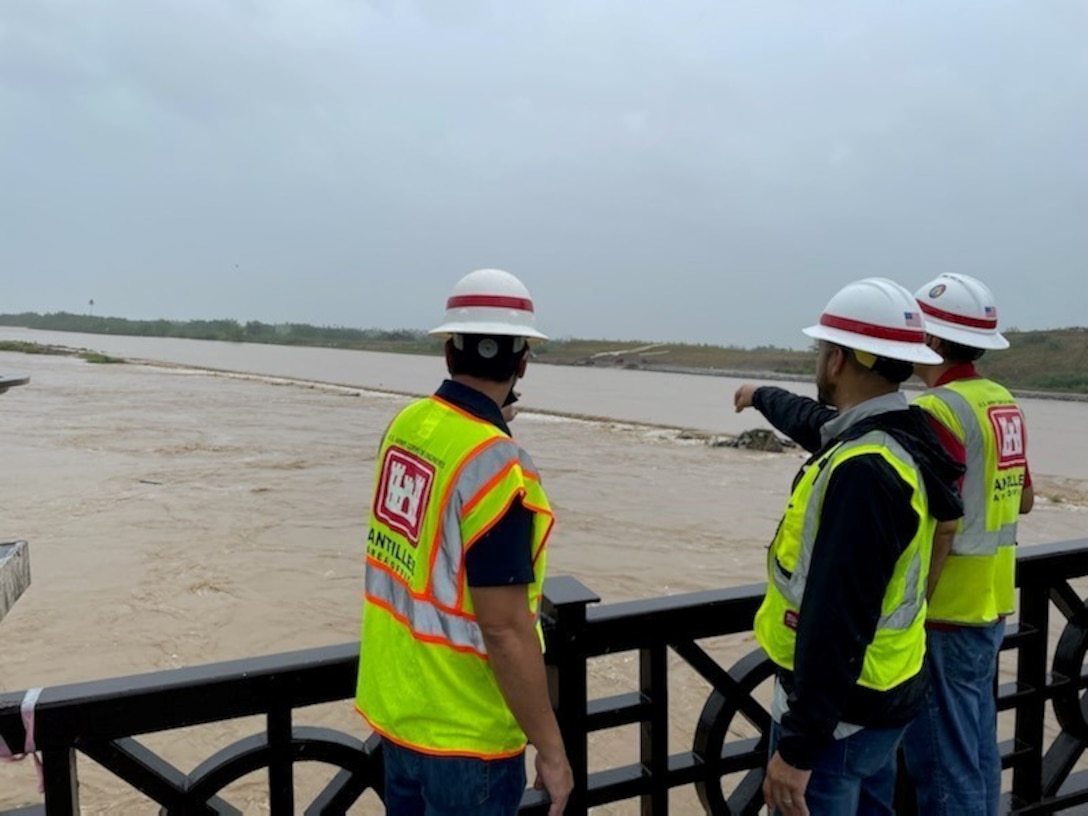 Civil Engineers from the U.S. Army Corps of Engineers, Jacksonville Antilles Office inspect flooding at the Rio de la Plata project in Dorado.