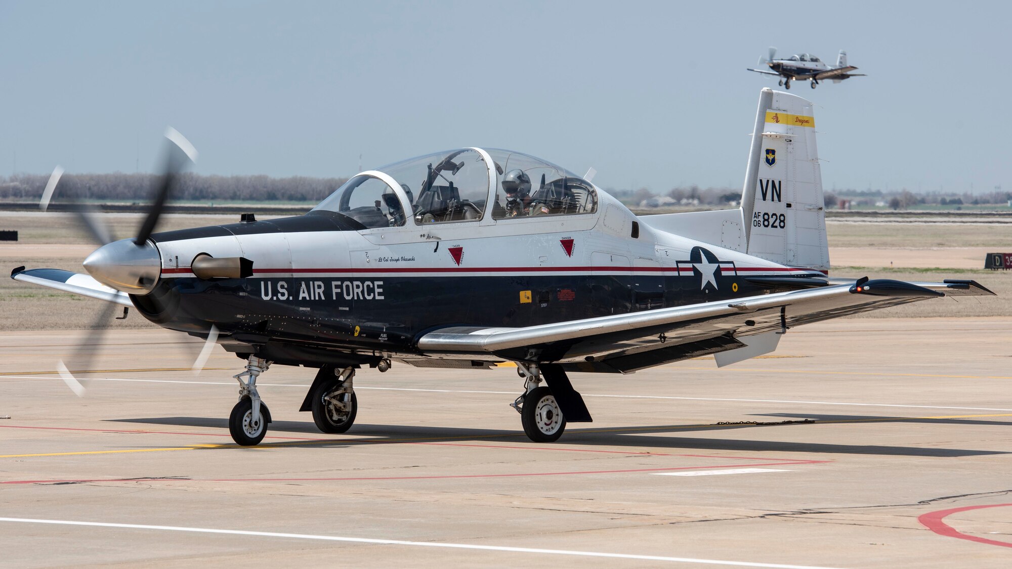 A T-6 Texan II takes off from the flightline at Vance Air Force Base on Mar. 27, 2019. The T-6A Texan II is a single-engine, two-seat primary trainer designed to train undergraduate pilot training students. (U.S. Air Force Photo by Airman 1st Class Octavius Thompson)