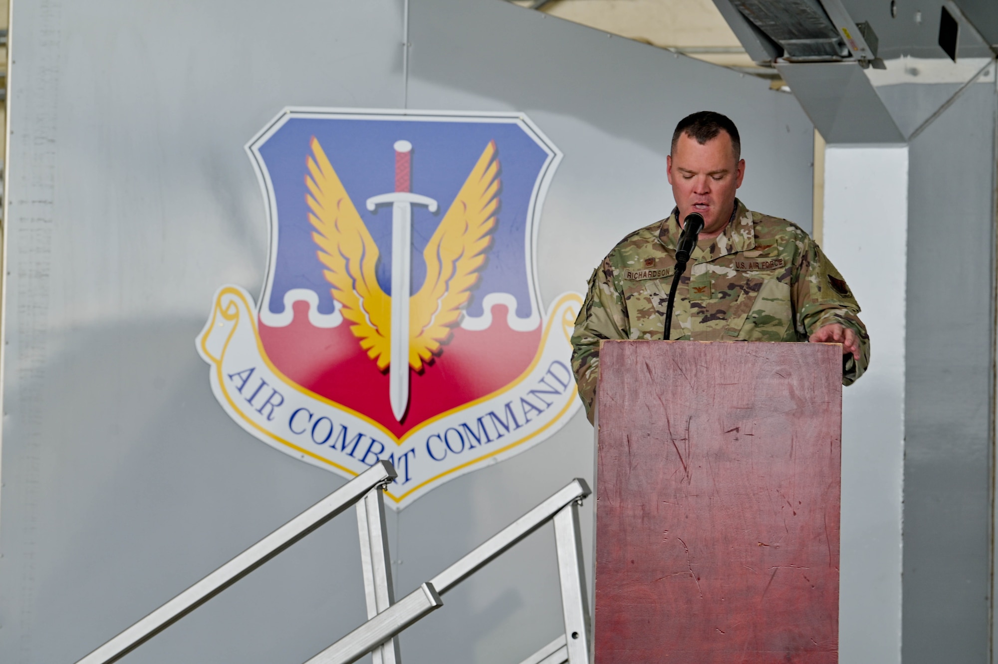 U.S. Air Force Col. Christopher Richardson, 347th Rescue Group commander, gives a speech during the HH-60W Jolly Green II Initial Operational Capability ceremony, Sept. 9, 2022 at Moody Air Force Base, Georgia. The ceremony displayed the platform’s operational capabilities and signifies that the HH-60W has met the criteria for IOC and awaits declaration. (U.S. Air Force photo by Senior Airman Rebeckah Medeiros)