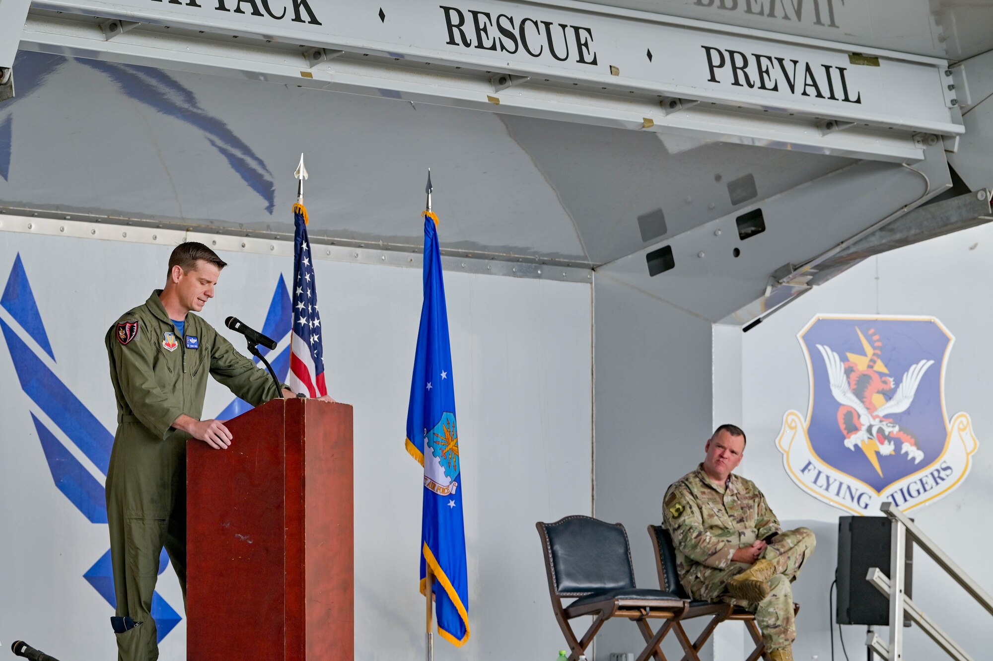 U.S. Air Force Col. Russell Cook, 23rd Wing commander, gives a speech during the HH-60W Jolly Green II Initial Operational Capability ceremony, Sept. 9, 2022 at Moody Air Force Base, Georgia. Cook believes the future of Air Force Rescue is secure and Moody's team is ready to recover anybody, anytime, anywhere against any adversary. The ceremony displayed the platform’s operational capabilities and signifies that the HH-60W has met the criteria for IOC and awaits declaration. (U.S. Air Force photo by Senior Airman Rebeckah Medeiros)