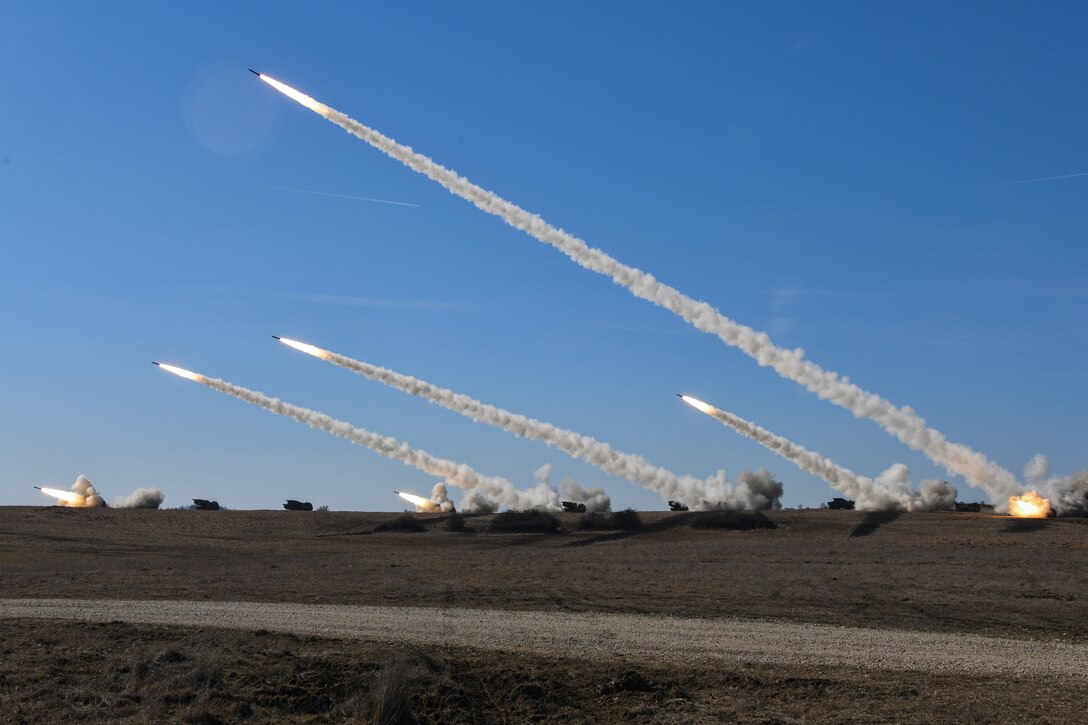 Multiple rockets are fired simultaneously.