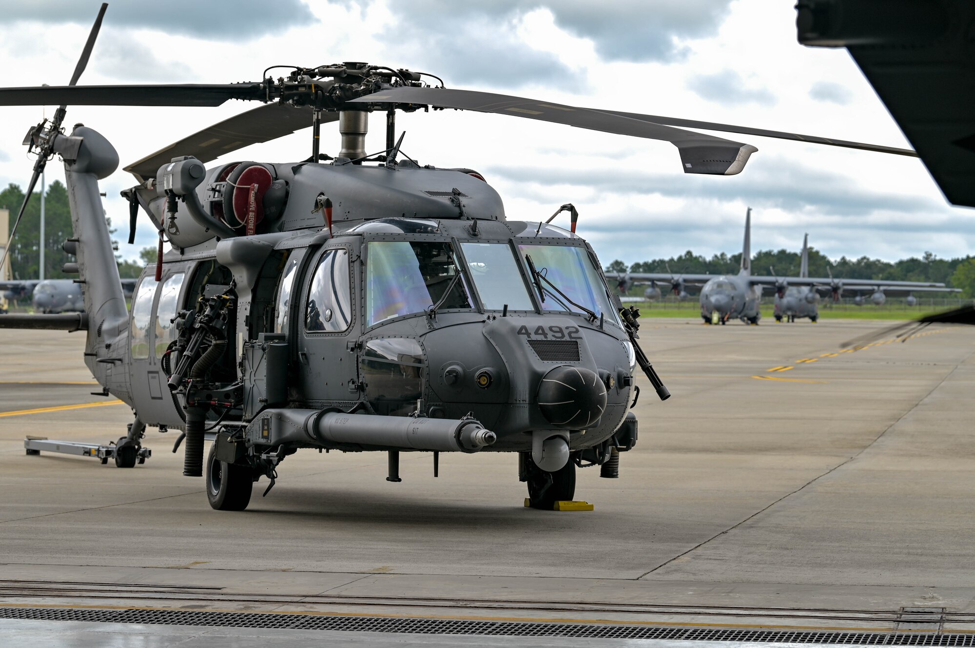 An HH-60W Jolly Green II helicopter is parked on the flight line during the HH-60W Initial Operational Capability ceremony, Sept. 9, 2022 at Moody Air Force Base, Georgia. The ceremony displayed the platform’s operational capabilities and signifies that the HH-60W has met the criteria for IOC and awaits declaration. (U.S. Air Force photo by Senior Airman Rebeckah Medeiros)