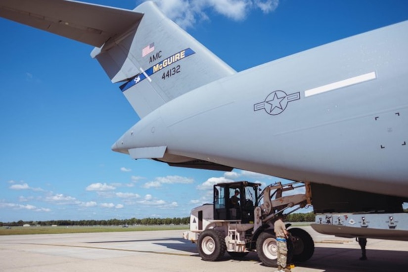 Cargo is loaded onto C-17 ramp