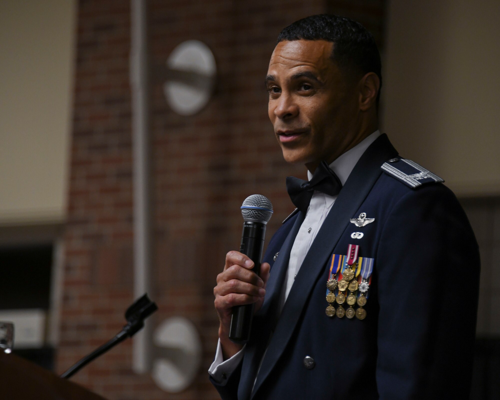 U.S. Air Force Col. Timothy Curry, 319th Reconnaissance Wing commander, speaks during the 319th RW’s celebration of the Air Force’s 75th birthday at the Ralph Englestad Arena in Grand Forks, North Dakota, Sept. 16, 2022. The theme for the ball called airmen to “Innovate, Accelerate and Thrive,” to celebrate what the Air Force was able to accomplish over the past 75 years of service and to look forward to a bright future. (U.S. Air Force photo by Senior Airman Roxanne A. Belovarac)