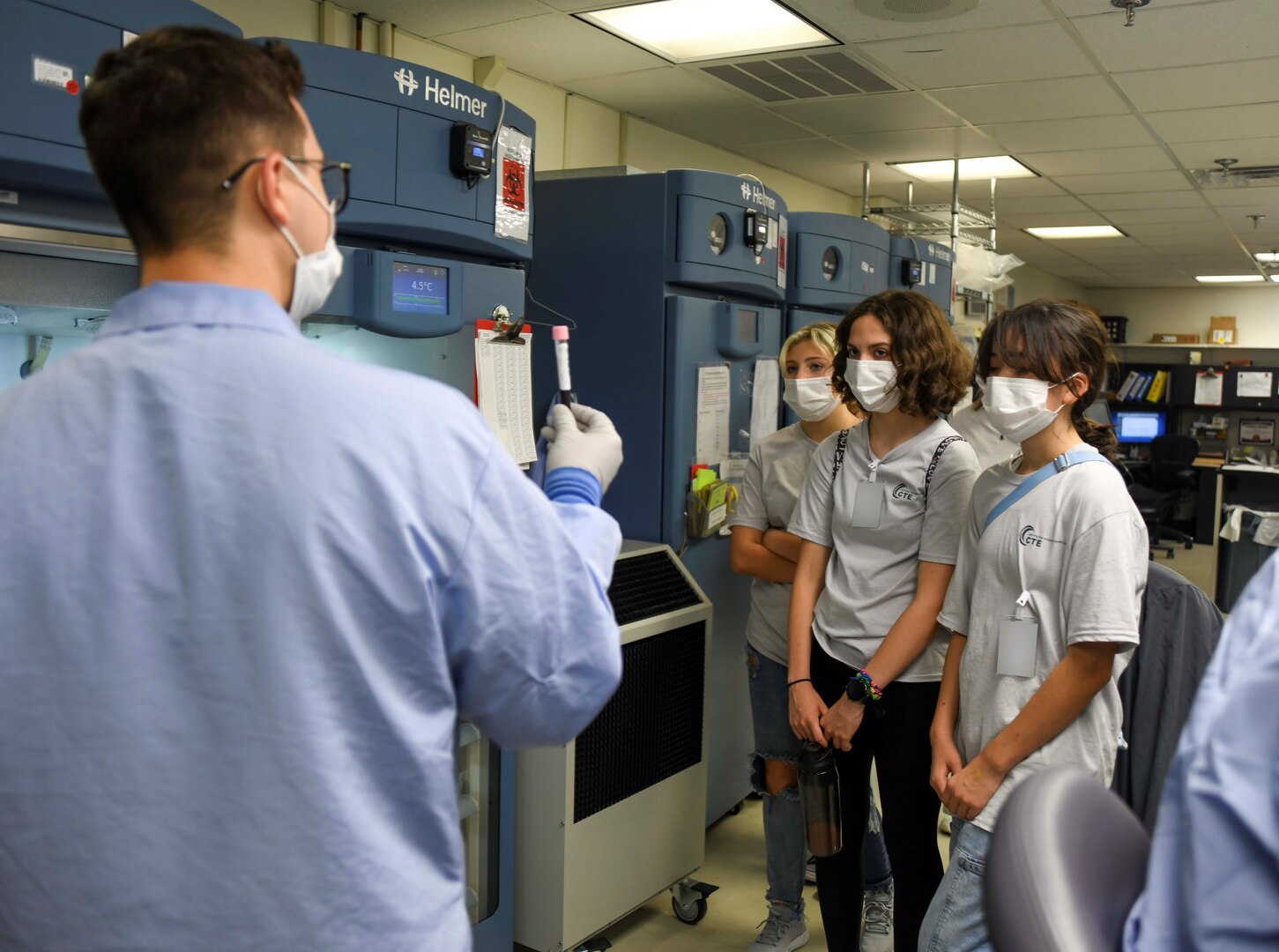 Laboratory staff demonstrate lab testing procedures to high school students on June 16, 2022. Naval Medical Center Camp Lejeune's Lab recently received a compliance rate of 99.9% on their recent inspection from the College of American Pathologists.