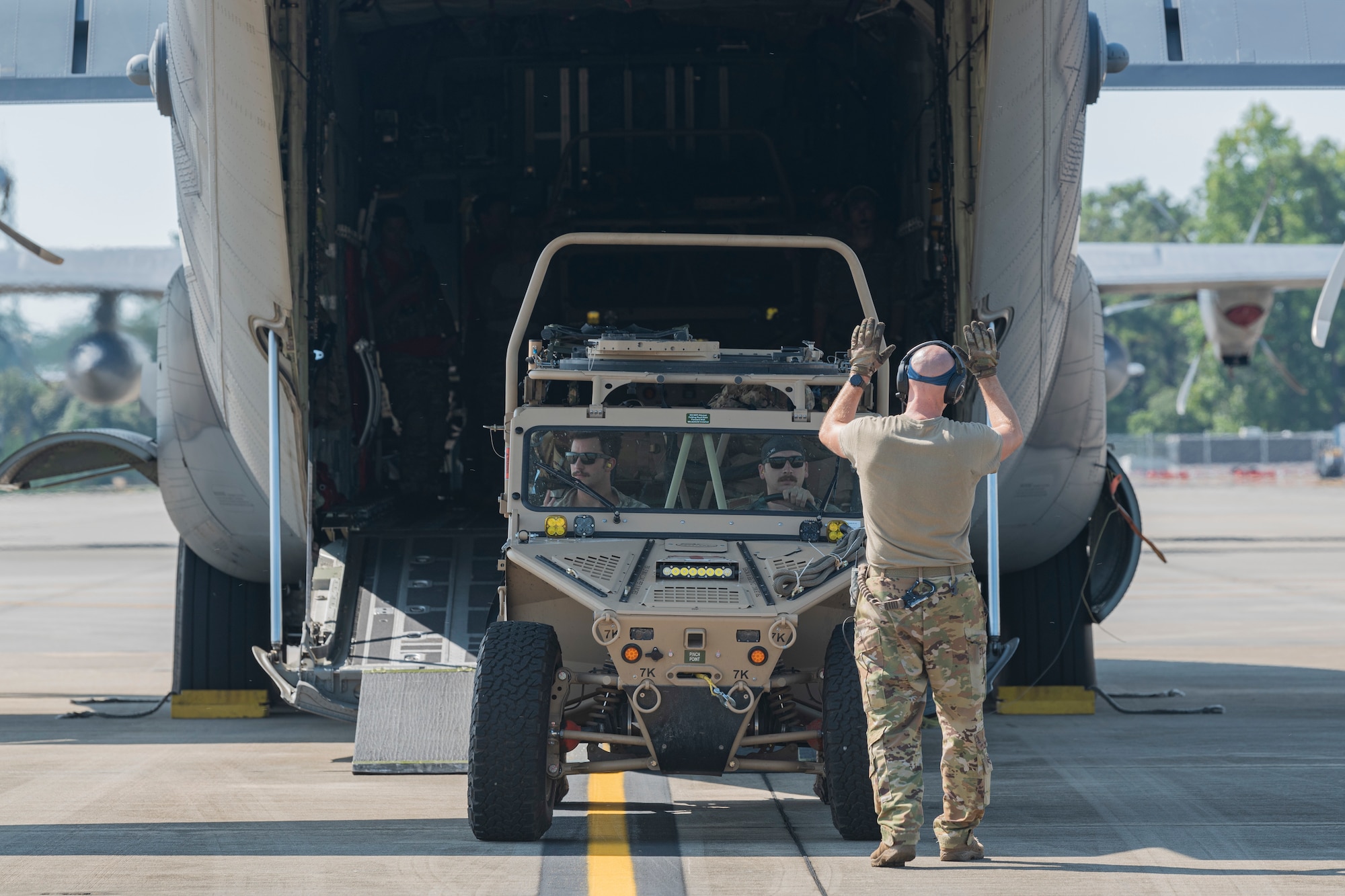 U.S. Air Force Airmen assigned to the 38th Rescue Squadron prepare to execute a combat search and rescue demonstration at Moody Air Force Base, Georgia, Sept. 15, 2022. Members of the Egyptian Naval and Air Forces participated in a CSAR subject matter expert exchange, supporting the strategic security relationship that exists between the U.S. and Egypt. Engagements such as this ensure that the security relationship is not only forged at the strategic level but also the tactical and operational levels, creating a cohesive, layered approach to creating a safe and stable theater. (U.S. Air Force photo by Senior Airman Jasmine M. Barnes)