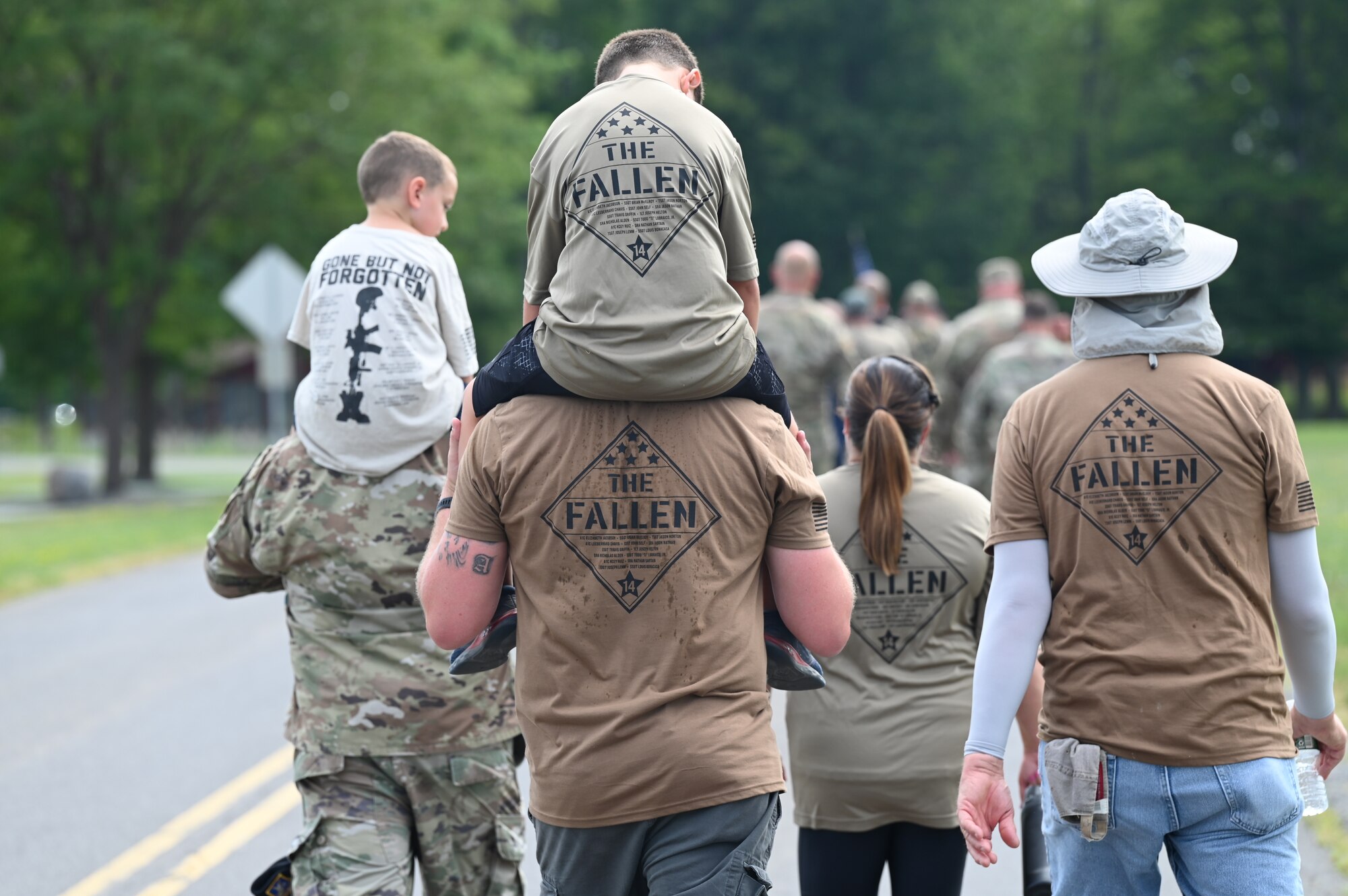174th Security Forces Squadron hosted the annual Fallen Defenders Ruck March held at Hancock Air National Guard Base on August 17,2022. 174th Attack Wing members, family and friends participated in the opening ceremony and the 2.8 mile march. The event was held to honor the 14 Security Forces members who were killed in action since September 11, 2001. (U.S. Air Force photo by Staff Sgt. Ty-leal Hodge)