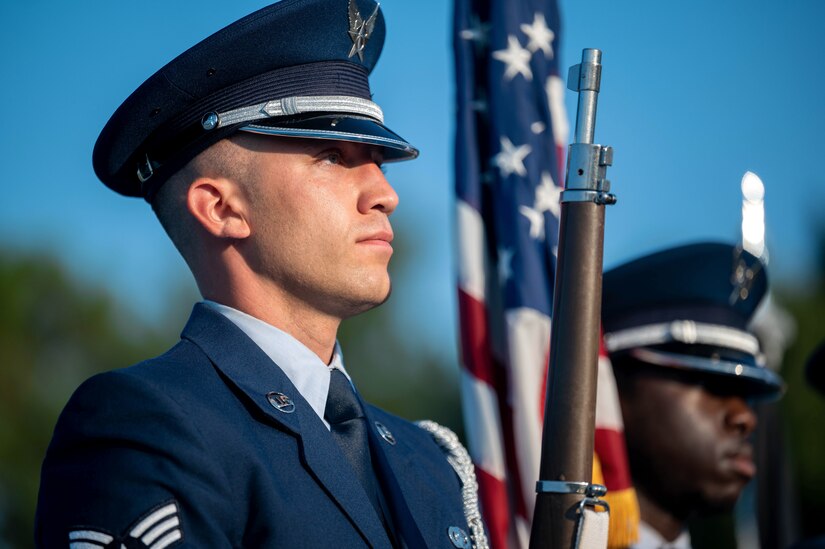 U.S. Air Force, Senior Airman Jacob LeBlanc from the Langley Air Force Base Honor Guard performs the presentation of colors during the National POW/MIA Recognition Day ceremony at Joint Base Langley-Eustis, Virginia, Sept. 15, 2022.
