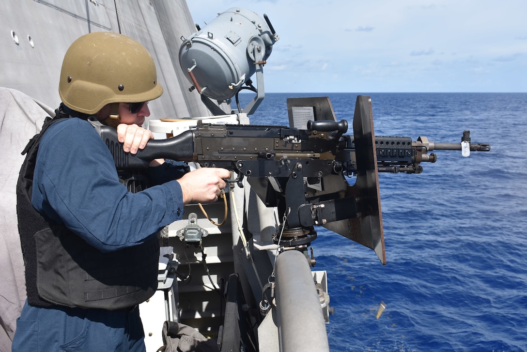 Mineman 1st Class Luke Poirier fires an M240B machine gun during a crew serve weapons shoot aboard the Freedom-variant littoral combat ship USS Billings (LCS 15) in the Caribbean Sea, Sept. 13, 2022. Billings is deployed to the U.S. 4th Fleet area of operations to support Joint Interagency Task Force South’s mission, which includes counter-illicit drug trafficking missions in the Caribbean and Eastern Pacific.
