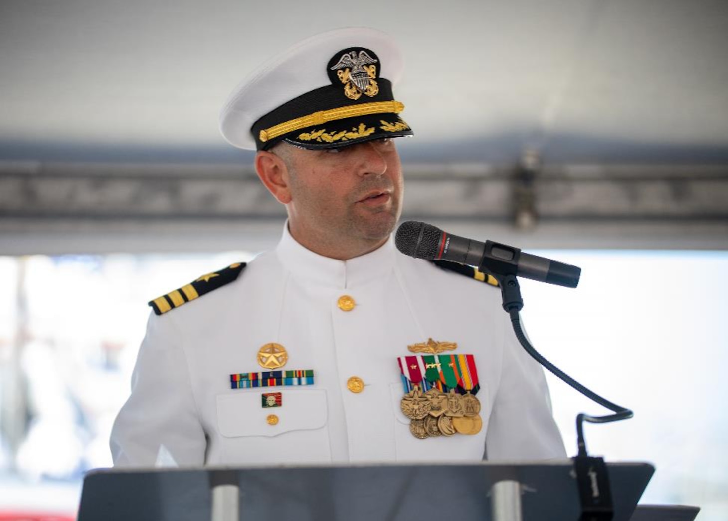 NORFOLK, Va. (Sept. 22, 2022) Cmdr. Gregory J. Piorun, Jr., commanding officer of the Ticonderoga-class, guided-missile cruiser USS Anzio (CG 68), speaks during the ship’s decommissioning ceremony onboard Naval Station Norfolk, Sept. 22, 2022. Anzio was decommissioned after 30 years of service.  (U.S. Navy photo by Mass Communication Specialist 3rd Class Bradley Rickard)