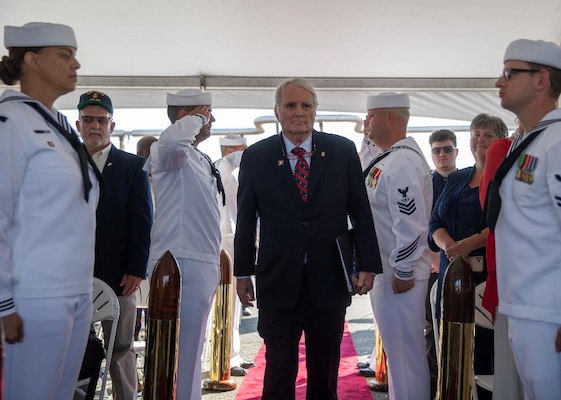 NORFOLK, Va. (Sept. 22, 2022) Retired U.S. Navy Capt. H. Wyman Howard, Jr., plank owner and former commanding officer of the Ticonderoga-class, guided-missile cruiser USS Anzio (CG 68), arrives as a member of the official party during the ship's decommissioning ceremony onboard Naval Station Norfolk, Sept. 22, 2022. Anzio was decommissioned after 30 years of service.  (U.S. Navy photo by Mass Communication Specialist 3rd Class Bradley Rickard