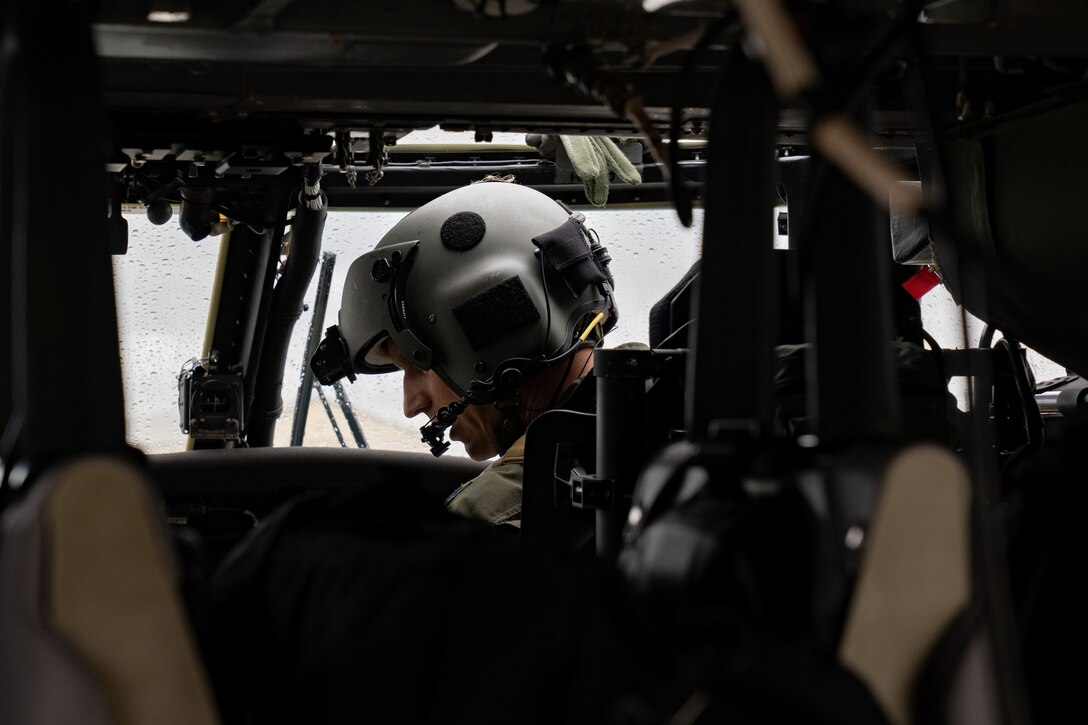 Photo of a pilot in a helicopter