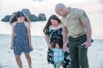 Marine Corps Staff Sgt. Victor Quezada, the aviation supply and preventative maintenance inspection supply staff noncommissioned officer in charge with Marine Aviation Logistics Squadron 36, 1st Marine Aircraft Wing, spends time with his family in Chatan, Okinawa, Japan, April 6, 2022.