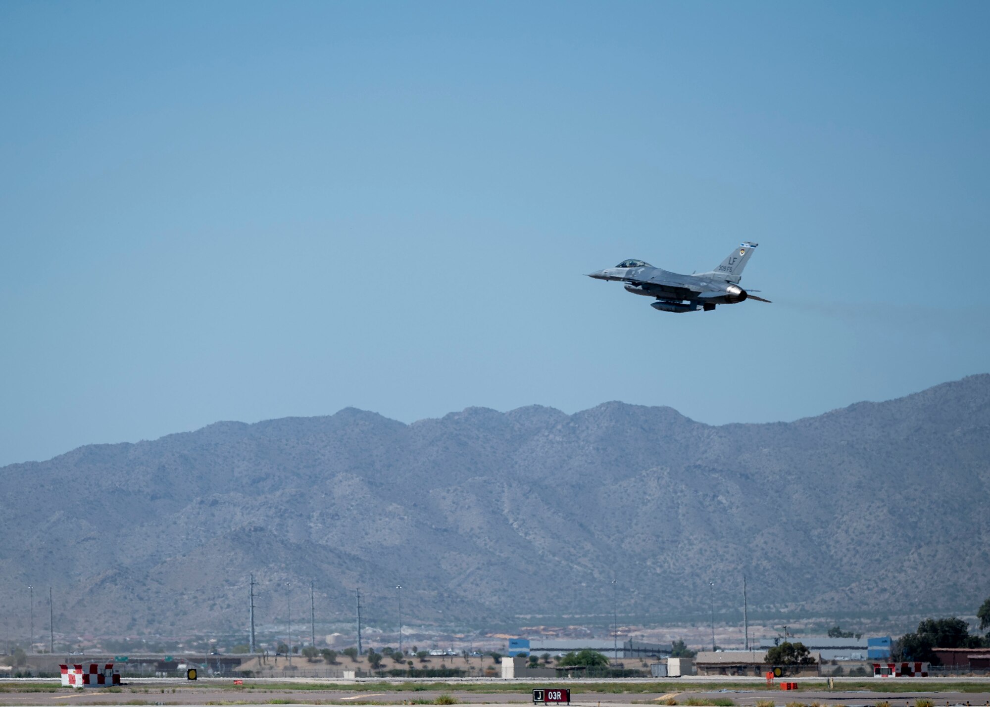 A retiring F-16 Fighting Falcon takes off for the last time in its tenure Sept. 6, 2022, at Luke Air Force Base, Arizona.