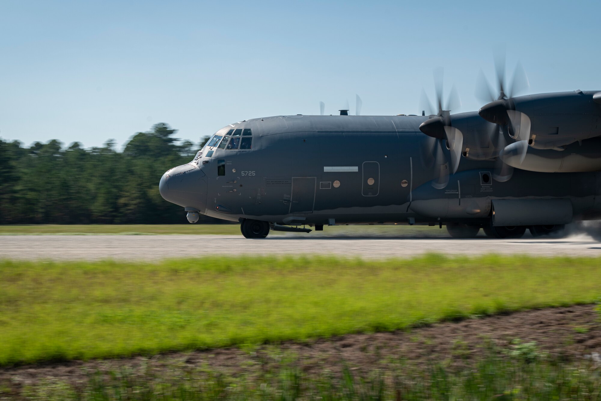 A C-130J Combat King II lands on a runway during a combat search and rescue demonstration at Moody Air Force Base, Georgia, Sept. 15, 2022. Members of the Egyptian Naval and Air Forces participated in a CSAR subject matter expert exchange, supporting the strategic security relationship that exists between the U.S. and Egypt. Engagements such as this ensure that the security relationship is not only forged at the strategic level but also the tactical and operational levels, creating a cohesive, layered approach to creating a safe and stable theater. (U.S. Air Force photo by Senior Airman Jasmine M. Barnes)