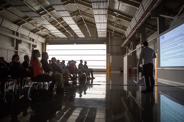 U.S. and U.K. government and military leaders listen to a brief Sept. 7, 2022, prior to a demonstration during Exercise Atlantic Thunder 2022.