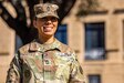 U.S. Army South Soldier, Master Sgt. Kathryan Torres, command lead sexual assault response coordinator, stands in front of Army South headquarters on Joint Base San Antonio-Fort Sam Houston, Sept. 21, 2022. Torres' journey to Army service was forged by great parenting and a supportive family. (U.S. Army photo by Spc. Joshua Taeckens)