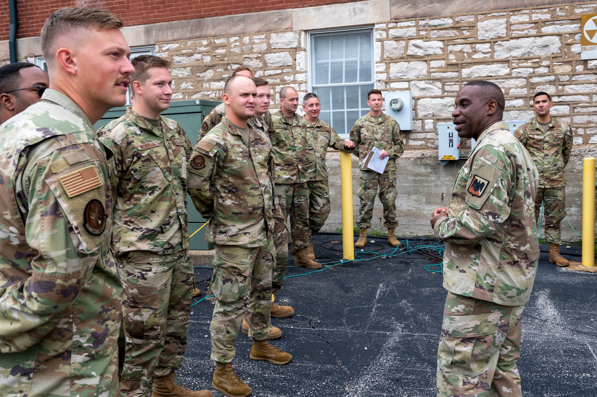 U.S. Air Force Chief Master Sgt. Maurice Williams, right, command chief, Air National Guard, addresses Airmen of the 239th Combat Communications Squadron, 131st Bomb Wing, Missouri National Guard at Jefferson Barracks Air National Guard Base, St. Louis, Missouri, Sept. 11, 2022. During his visit, Williams spoke with leadership and Airmen about the importance of the mission, leadership qualities and the Airmen's impact on the future of the Air Force. (U.S. Air National Guard photo by Senior Airman Whitney Erhart)
