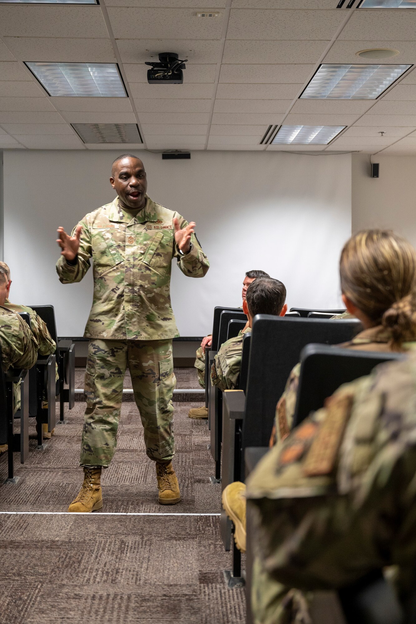 U.S. Air Force Chief Master Sgt. Maurice Williams, center, command chief, Air National Guard, addresses Airmen of the 131st Bomb Wing, Missouri National Guard, at a Top 3 meeting, during his visit at Jefferson Barracks Air National Guard Base, St. Louis, Missouri, Sept. 11, 2022. During the meeting, Williams spoke about how to empower Airmen within the organization by creating a professional and structured environment. (U.S. Air National Guard photo by Senior Airman Whitney Erhart)