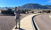 Sgt. Daniel Ortiz, a human resources sergeant with the 1st Space Brigade, poses for a photo with his son, Bradley, at Fort Carson, Colorado, April, 2022. (Courtesy photo)