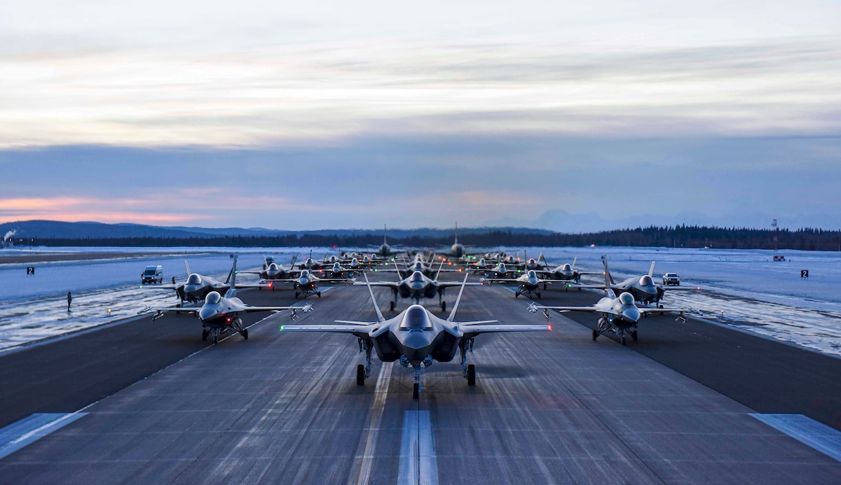 Aircraft perform an elephant walk along Eielson Air Force Base's flightline