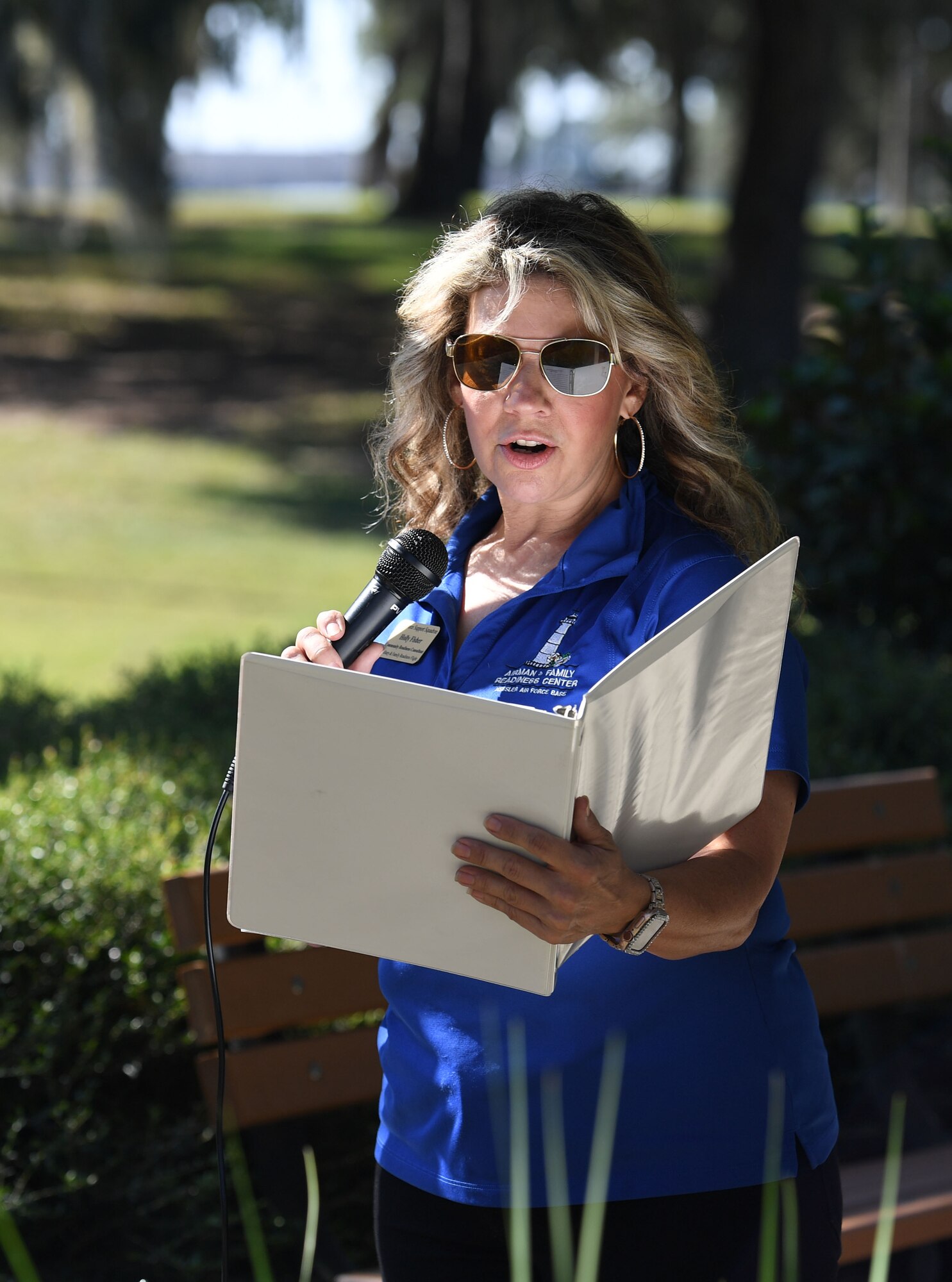 Holly Fisher, 81st Force Support Squadron employment specialist, delivers remarks during the Air Force Families Forever Fallen Hero Butterfly Release at the marina park at Keesler Air Force Base, Mississippi, Sept. 23, 2022. The garden serves as a designated location where the families of our fallen heroes can find a serene area to pay tribute to their loved one as well as honoring our fallen service members. (U.S. Air Force photo by Kemberly Groue)