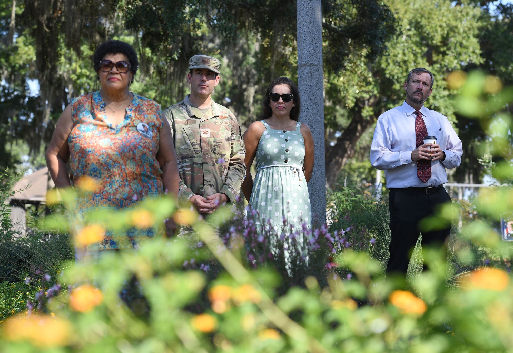 Keesler leadership and personnel gather during the Air Force Families Forever Fallen Hero Butterfly Release at the marina park at Keesler Air Force Base, Mississippi, Sept. 23, 2022. The garden serves as a designated location where the families of our fallen heroes can find a serene area to pay tribute to their loved one as well as honoring our fallen service members. (U.S. Air Force photo by Kemberly Groue)