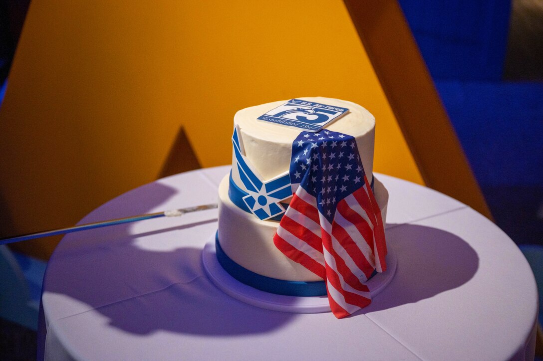 The 75th U.S. Air Force anniversary cake is cut during the Air Force Ball at the Virginia Air and Space Center, Hampton, Virginia, Sept. 17, 2022.