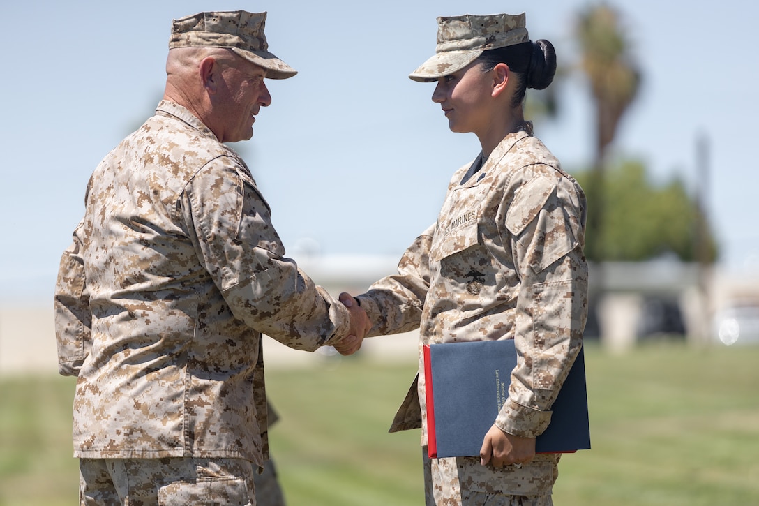 U.S. Marine Corps Sgt. Leilana TupuaRodriguez receives the Jim Kallstrom Award for her bravery while deployed with the 24th Marine Expeditionary Unit, supporting evacuations following the bombing in Kabul
