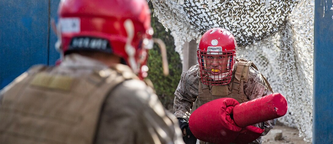 U.S. Marine Corps Recruit Angel E. Gonzalez, a recruit with India Company, 3rd Recruit Training Battalion, participates in a pugil sticks event at Marine Corps Recruit Depot San Diego, Sept. 13, 2022. Following the bayonet assault course, recruits executed Marine Corps Martial Arts Program techniques in a sparring event with pugil sticks. Gonzalez was recruited out of Recruiting Station Pittsburgh, Pa. (U.S. Marine Corps photo by Cpl. Grace J. Kindred)