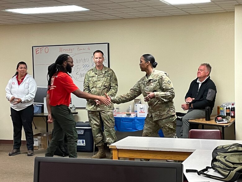 USACE’s South Pacific Division Commander, Col. Antoinette R. Gant, visited the Private Property Debris Removal team working in New Mexico Sept. 21. Gant personally thanked the team for their hard work and presented some of the emergency mission experts with coins.